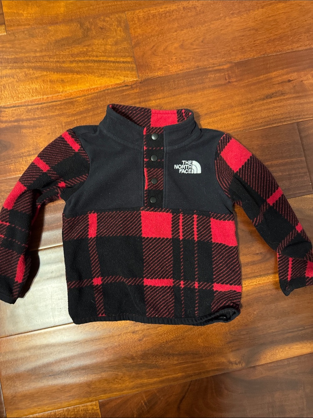 The North Face Infant Red and Black Plaid Snap Fleece Pullover